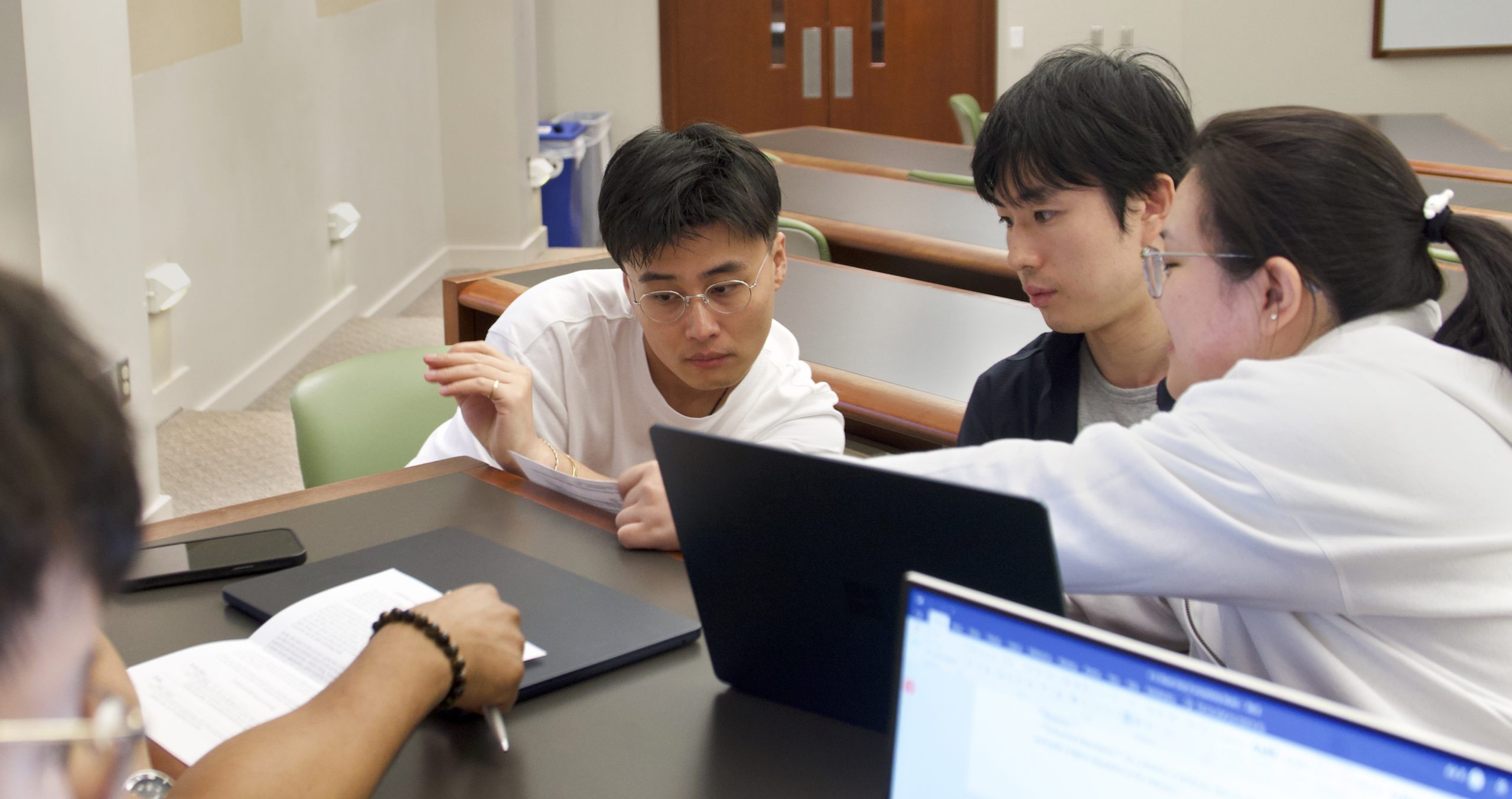 Student work together on a classroom task