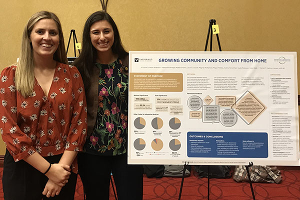 VUSN students presenting poster