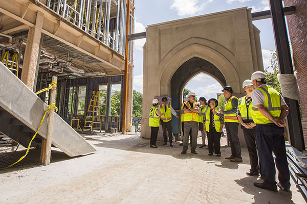 Dean Linda Norman and VUSN construction team representatives in lobby of new building