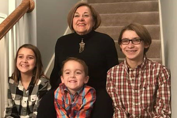 Alumna Judith Lea and her grandchildren