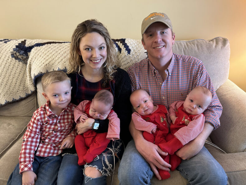 Greg and Monica Barton at home with their sons, Carter, left, and triplets Matthew, John and Weston.