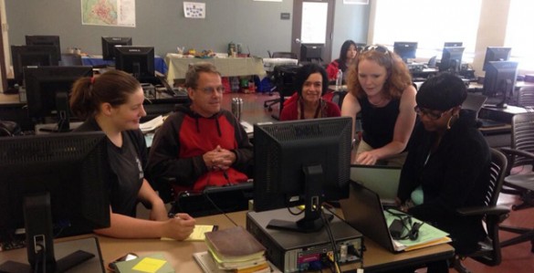 GIS_Technology Janey Camp, standing, demonstrates GIS mapping technology to Metro teachers.