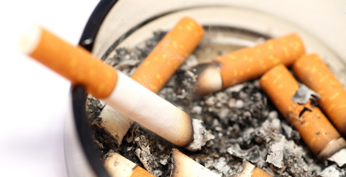 ashtray full of cigarette butts