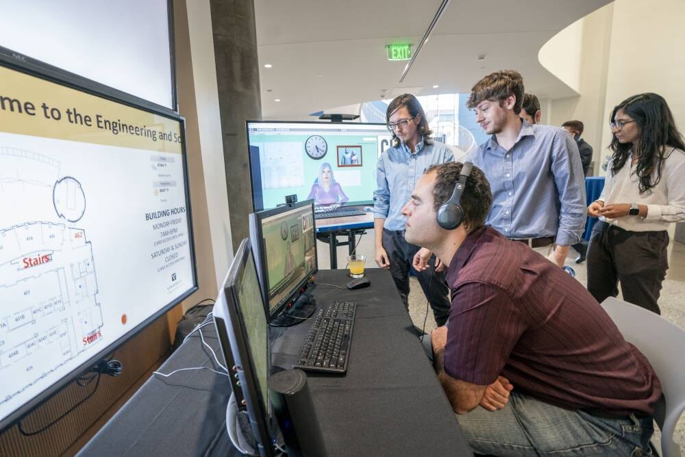 Dan Burger demonstrates FCAI workforce readiness software to visitors at the center. Dan Burger demonstrates FCAI workforce readiness software to visitors at the center.