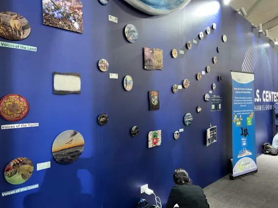 Megan Jordan, MA’19, PhD’22, and Chelsea Janda, BS’22, earned spots in an art competition at the U.S. Center, which is the official presence of the U.S. government at COP. (Submitted photo)