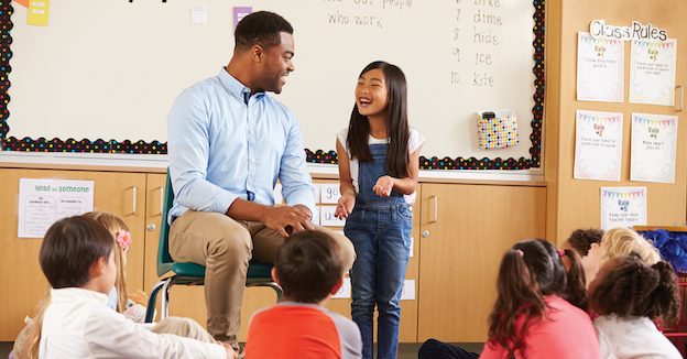 Elementary school teacher with class