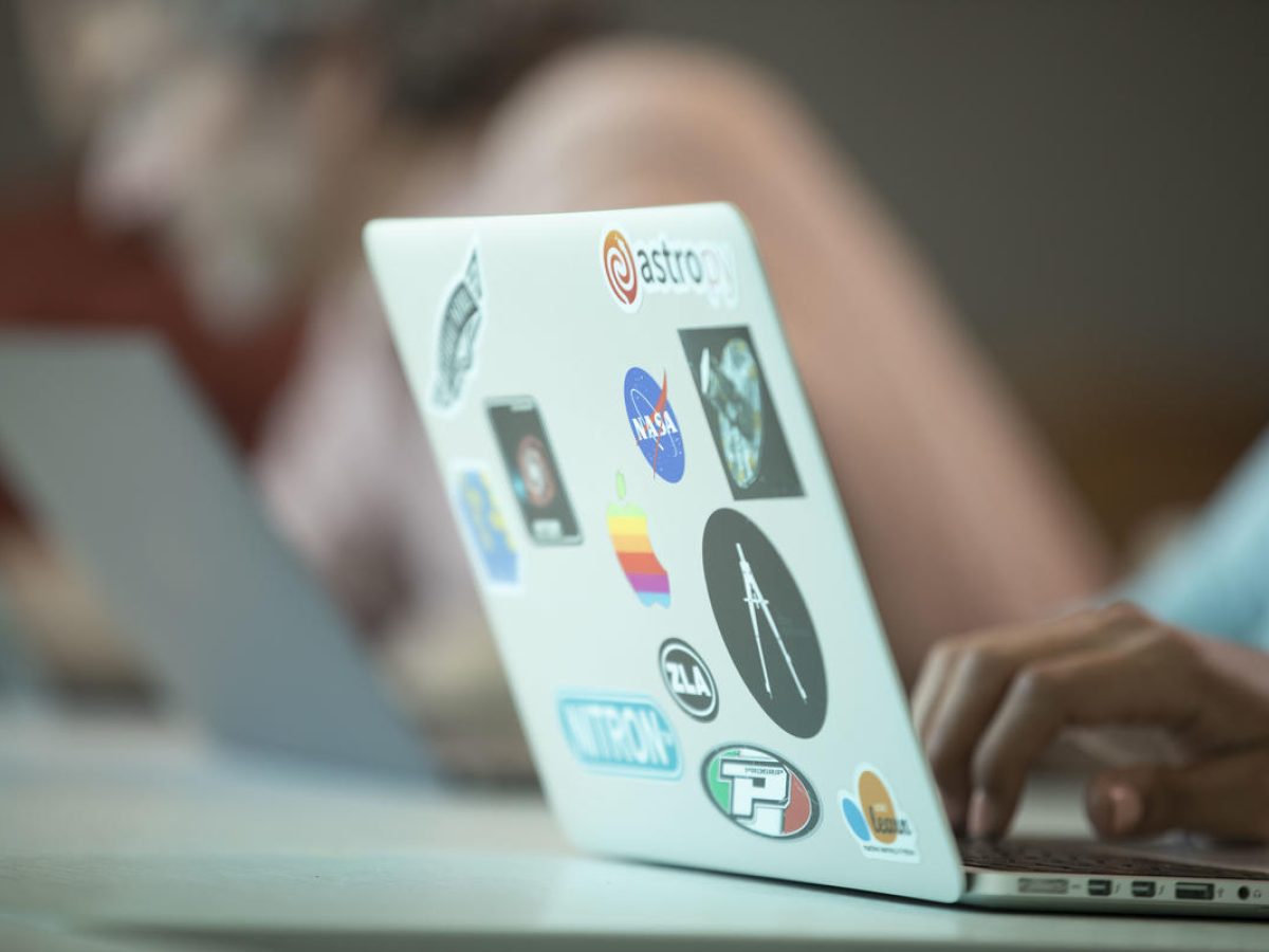 Image of staff next to equipment