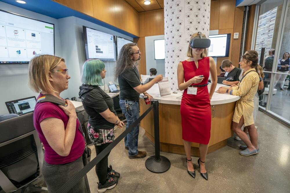 Visitors to the center experience VR technology created to help them understand the experiences of a neurodivergent individual.