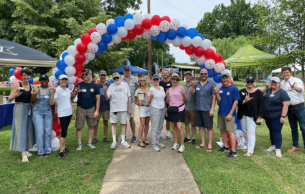 group photo of community members at Candidate Meet and Greet in Fannie Mae Dees Park