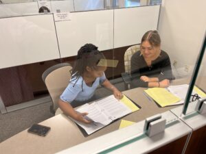 This image shows a Writing Studio writing consultation between two female-presenting students.