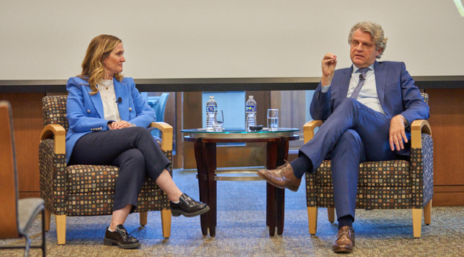 Marketing professor Kelly Goldsmith (left) and Chancellor Daniel Diermeier (right) discuss his book, <i>Reputation Analytics,</i> at the Central Library Community Room on April 26. (Harrison McClary/Vanderbilt)