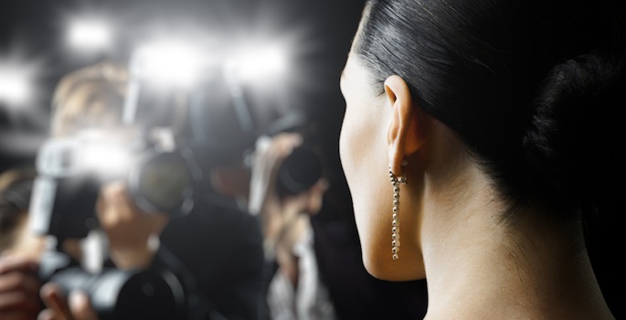 movie star facing paparazzi