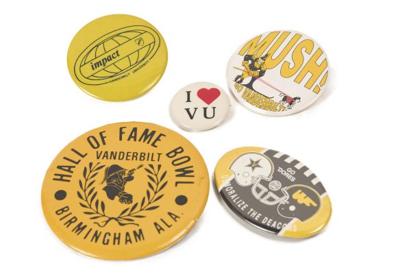 Various buttons in University Archives for the Impact Symposium, Hall of Fame Bowl and to show support for Vanderbilt