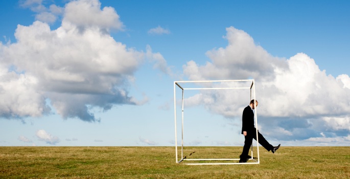 Man stepping outside a box