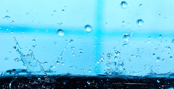 water drops splashing against solid surface