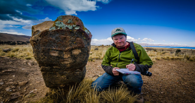 Associate Professor of Anthropology John Janusek researching Andean monoliths (courtesy of Andy Roddick)