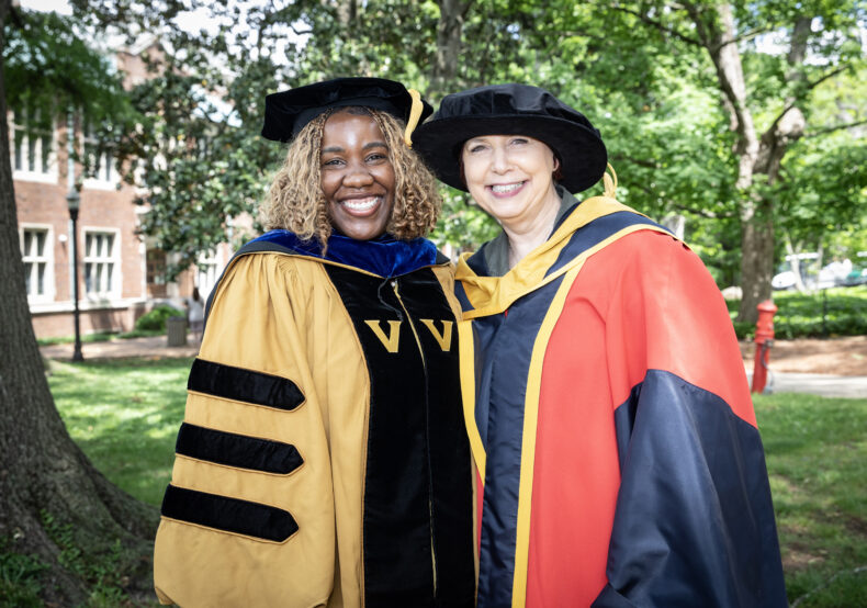 Ebony Hargrove-Wiley, receiving her PhD in Cancer Biology, and her faculty advisor Barbara Fingleton, PhD. (photo by Erin O. Smith)