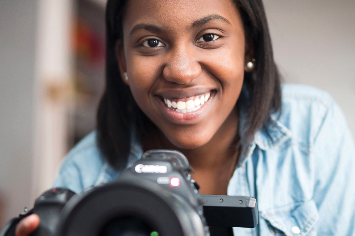 photo of Briana Francois holding a camera