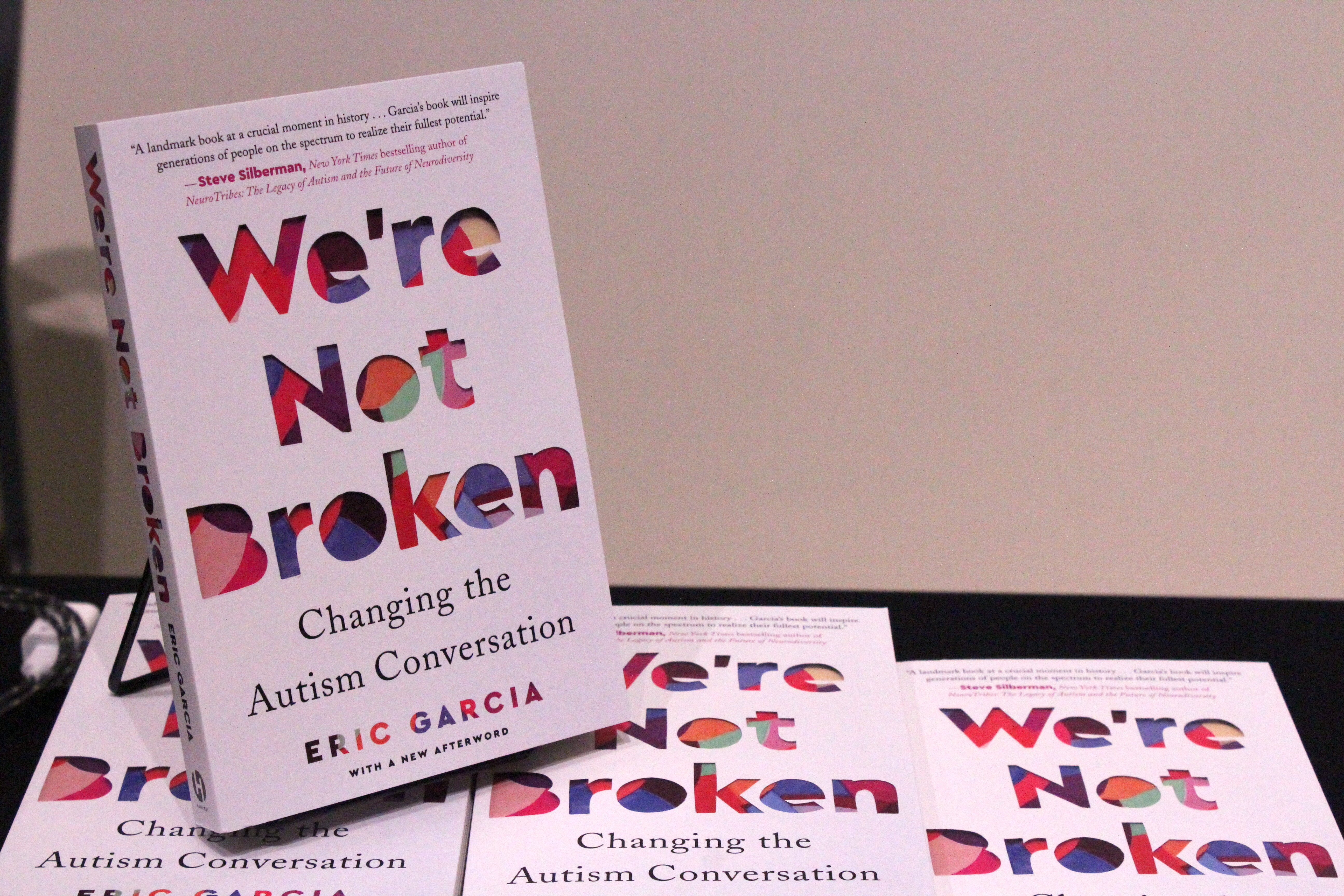 Eric Garcia's book 'We're Not Broken' was available for sale (and signing) at the College Autism Summit 2022