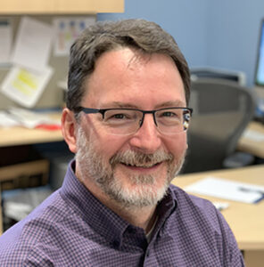 Photo of Danny Winder in his office.