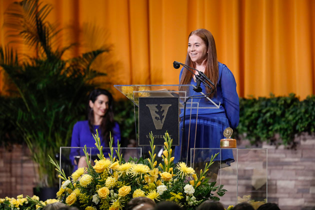 Class of 2018 Senior Class Fund chair Claire Fogarty presents seniors' record-breaking donation during Senior Day activities May 10 in Memorial Gym. (Joe Howell/Vanderbilt)