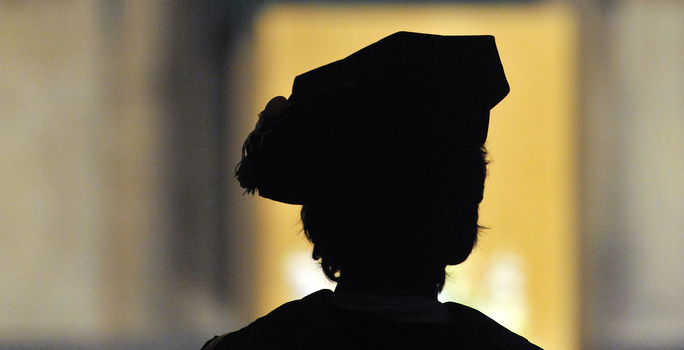 PhD graduate in regalia