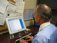 Counselor at computer