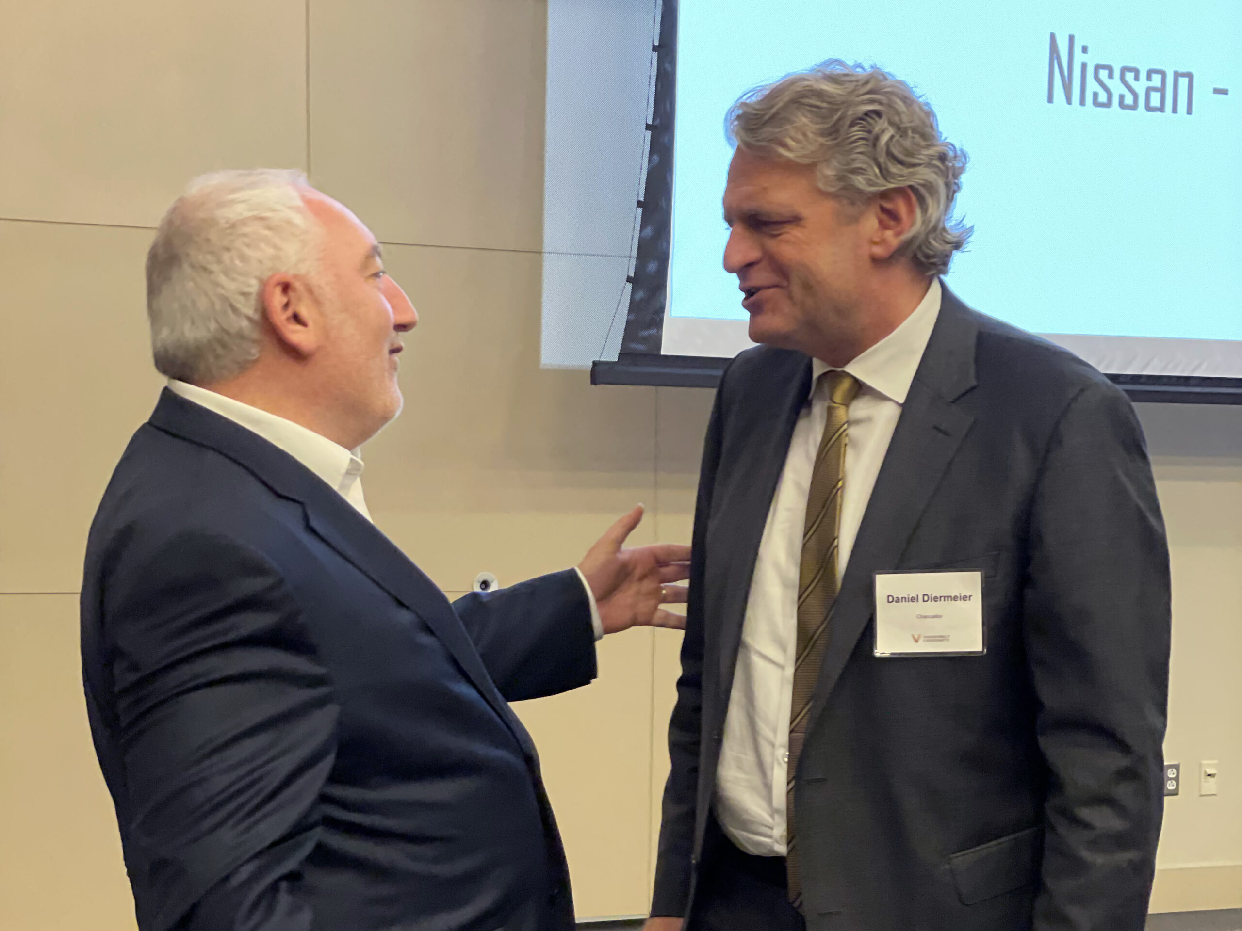 Nissan Chairperson Jeremie Papin and Vanderbilt Chancellor Daniel Diermeier