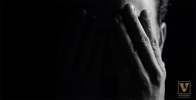 Stock image - depression - man's hand over face.