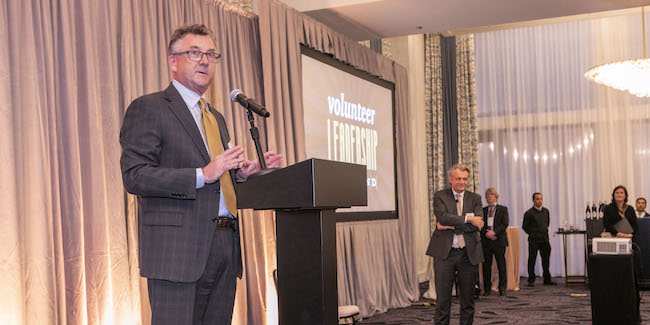 Vice Chancellor John Lutz speaks to attendees during Volunteer Leadership Weekend