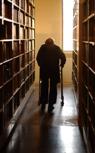 J. Leon Helguera working in the Helguera collection at the Vanderbilt library. 