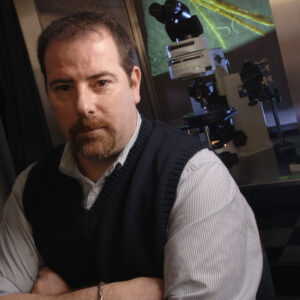 Man in front of a microscope