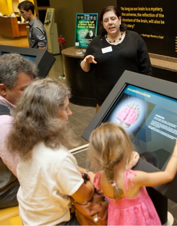 Brain matters -- family Family looking at electronic display