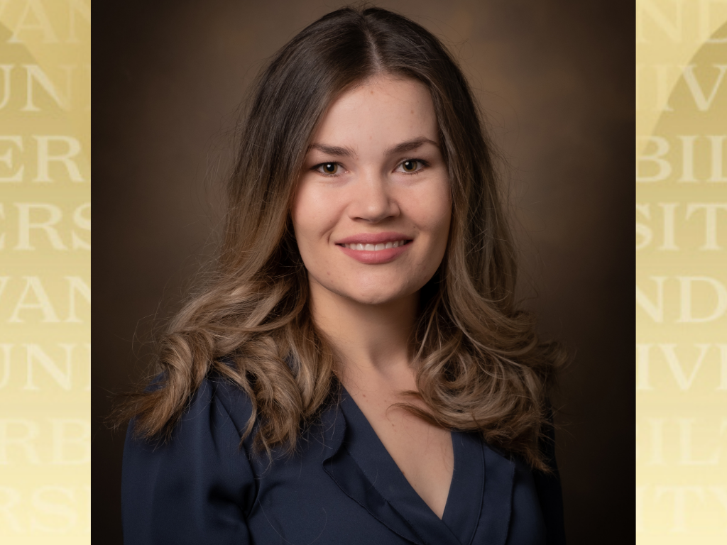 Jennifer Zachry headshot over Vanderbilt golded background