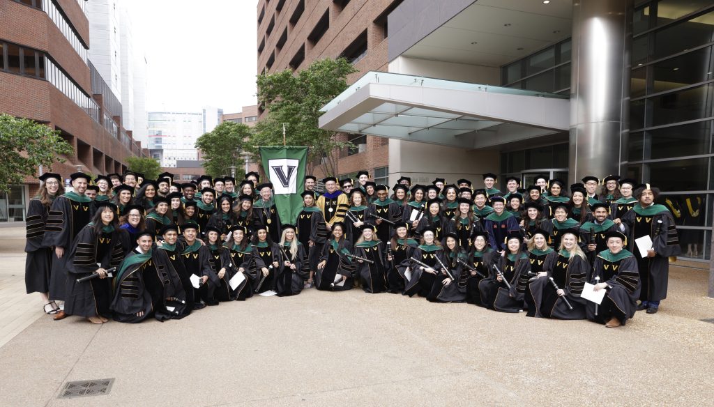 The Vanderbilt MD class of 2025 gathers outside Langford Auditorium after commencement.