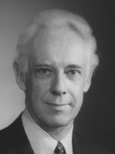 Black and white portrait of Stanford Moore.