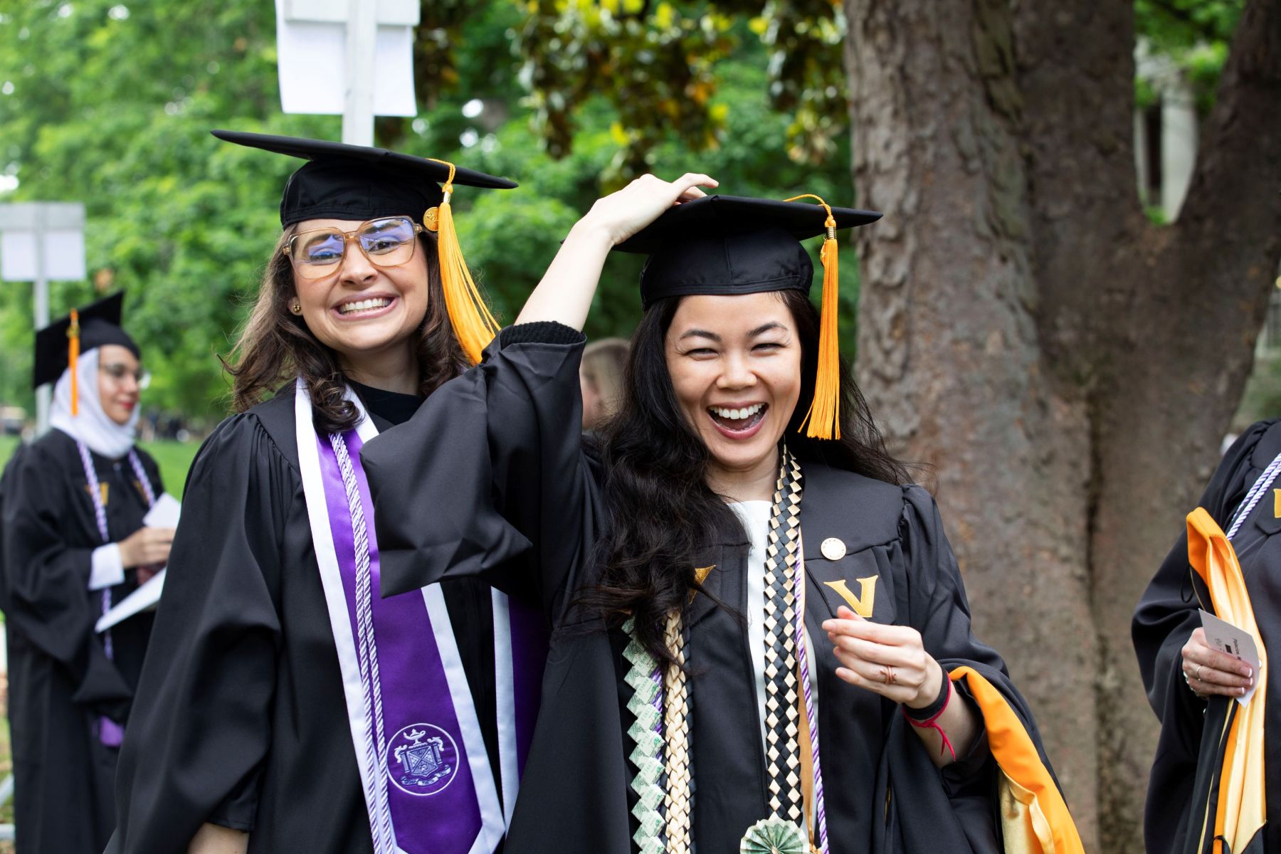 three students walking on campus