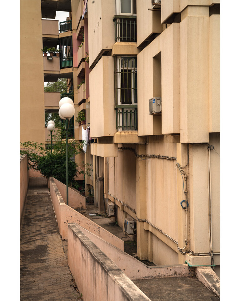 Caption: An apartment block of E-15 buildings in a residential neighborhood in Luanda, Angola. Photograph by Vesna Pavlović.