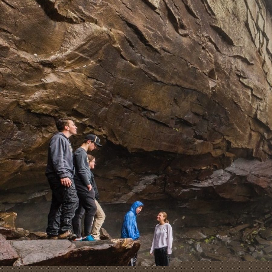 Exploring a waterfall.