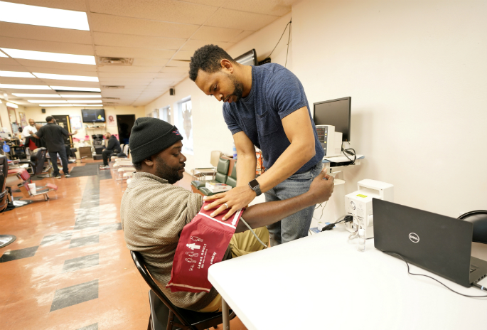 Jarod Parrish, PharmD, the study’s pharmacist, will check patrons' blood pressure inside eight Nashville barbershops to identify those who have uncontrolled hypertension.
