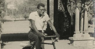 James Lawson on a Bicycle