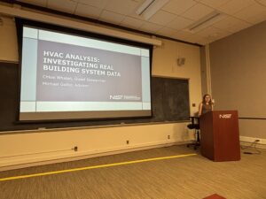 Chloe Whalen giving a presentation on her fellowship research.