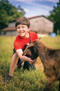 Eric Clauss and his son, Christopher, don’t let their food allergies interfere with fun, including spending time together on the family farm, but they are always prepared. Photo by Daniel Dubois.