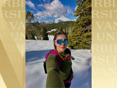 Photo of Hannah Waterman with VU gold background