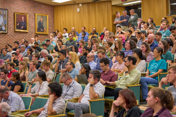 A crowd of students in a theater style classroom