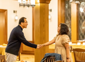 two people shaking hands