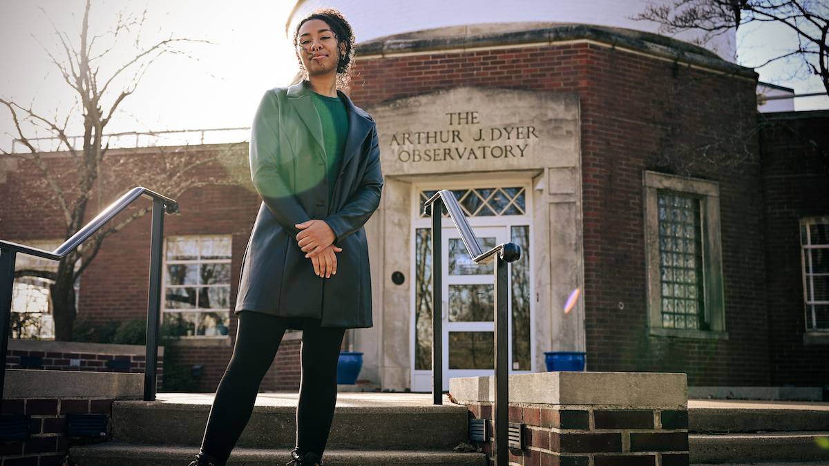 Shaniya Jordan standing in front of Dyer Observatory building