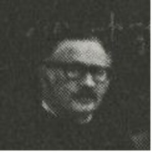 man in front of blackboard