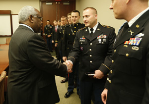 Alex Ellman meets Supreme Court Justice Clarence Thomas at the law school for a breakfast organized by Law Students for Veterans Affairs