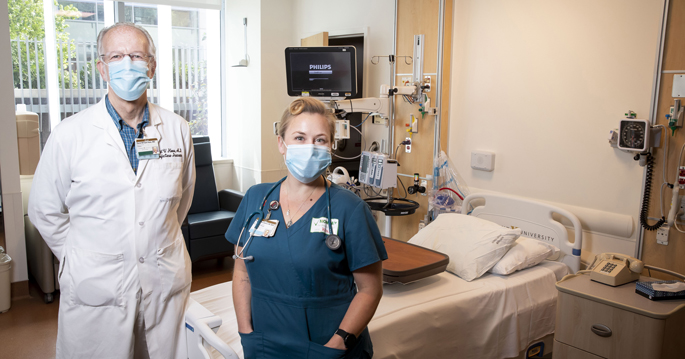 David Haas, MD, and Beverly Woodward, MSN, RN, are shown in a procedure room in VUMC’s Communicable Disease Response Unit. The room contains state-of-the-art infection prevention features and opens directly to the outside.